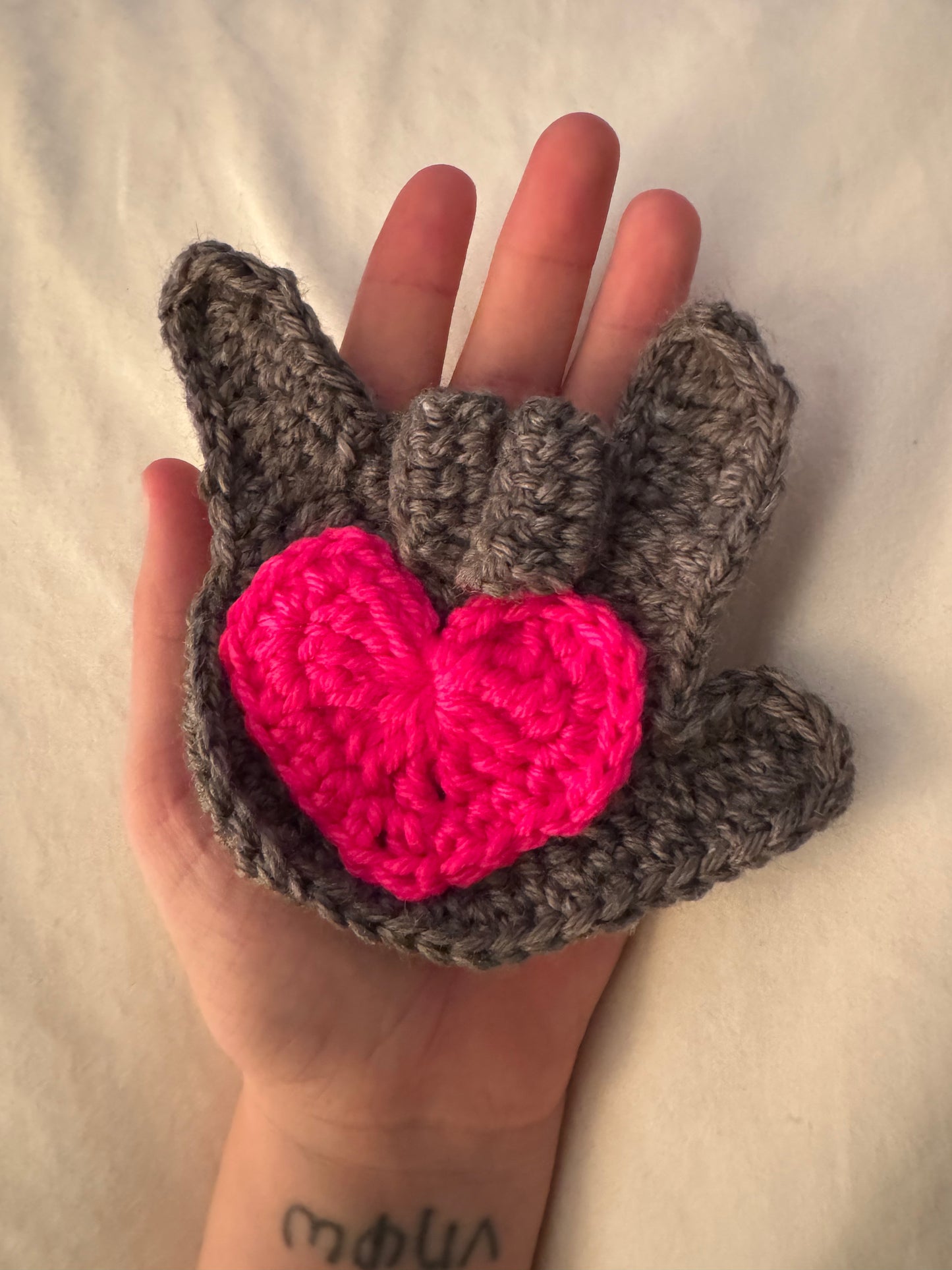 “I love you” in ASL with a heart